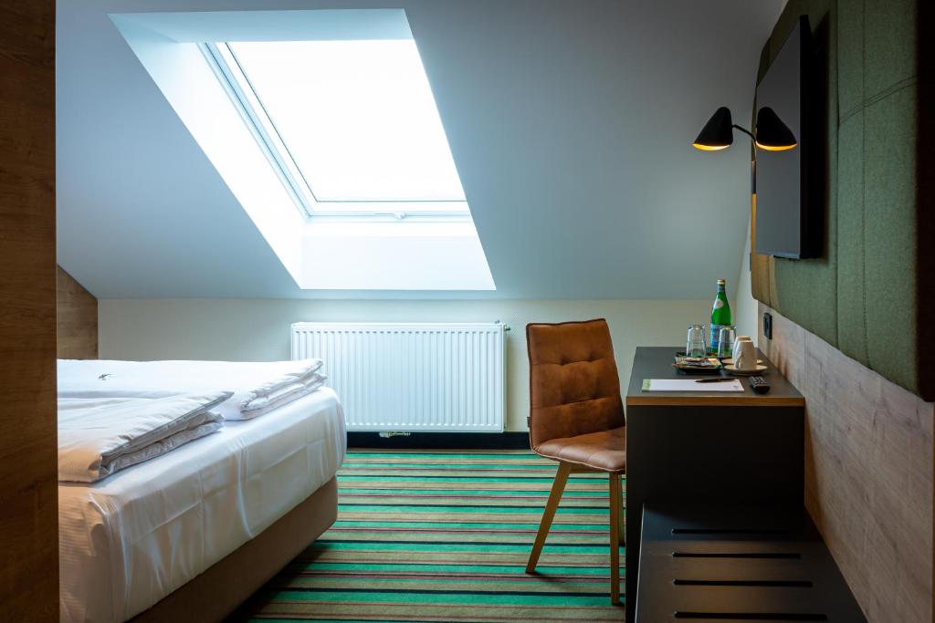 Voodi või voodid majutusasutuse Kb Hotel toas