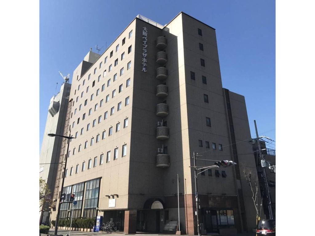 a building with a traffic light in front of it at Osaka Bay Plaza Hotel - Vacation STAY 44083v in Sakai