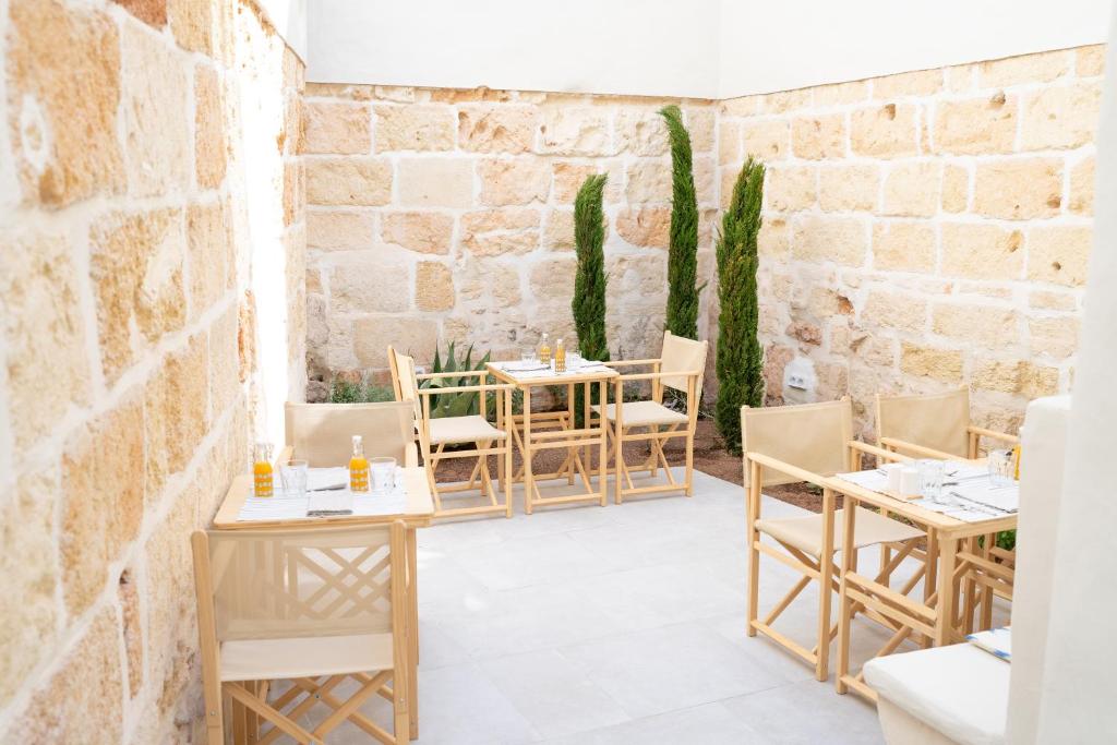 Een restaurant of ander eetgelegenheid bij Marosi Boutique Hotel