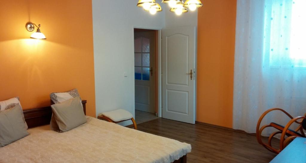 Postel nebo postele na pokoji v ubytování Apartman Nadezda
