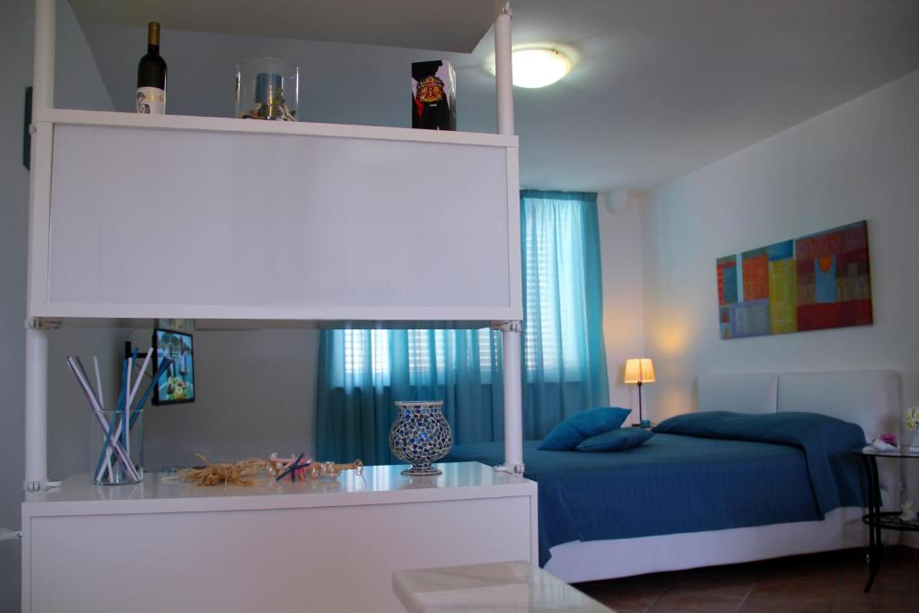 Postel nebo postele na pokoji v ubytování B&B Darsena