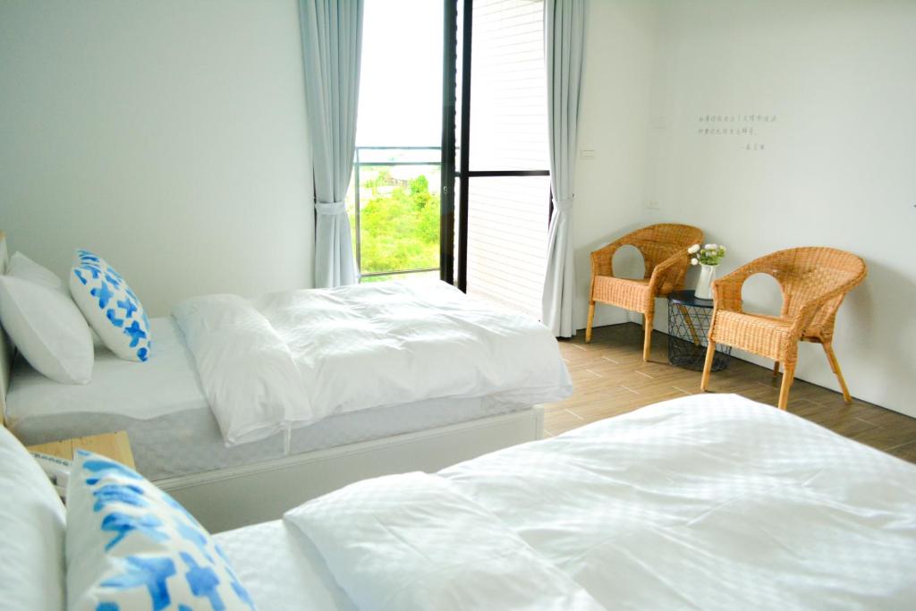 Postel nebo postele na pokoji v ubytování Golden W Hotel