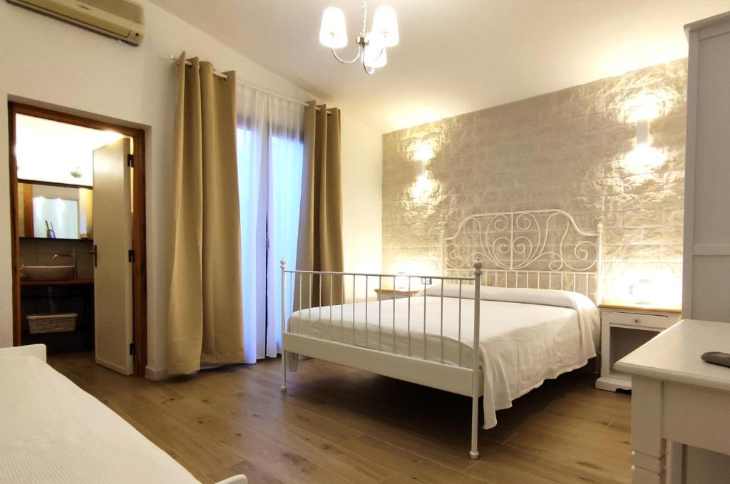 Postel nebo postele na pokoji v ubytování B&B Va' Pensiero