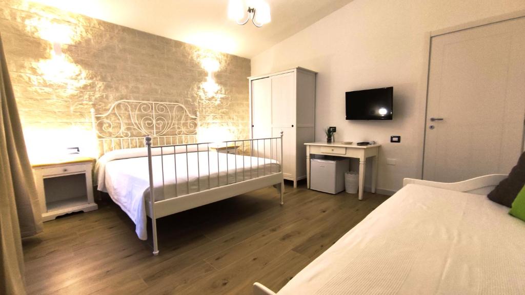 Postel nebo postele na pokoji v ubytování B&B Va' Pensiero