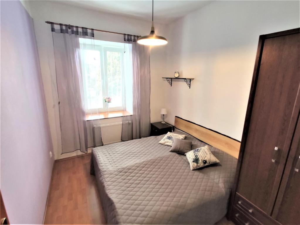 Postel nebo postele na pokoji v ubytování Apartmán Viky, Karlovice 251, 79323 Karlovice