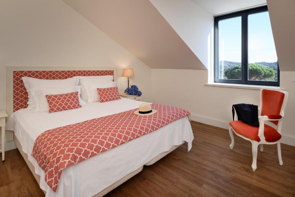 Кровать или кровати в номере Hotel Casa Palmela - Small Luxury Hotels of The World, Hotel & Villas