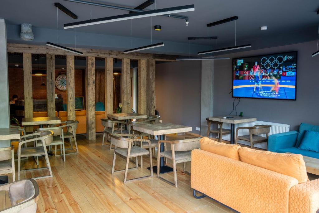 TV a/nebo společenská místnost v ubytování Lahili Boutique Hotel