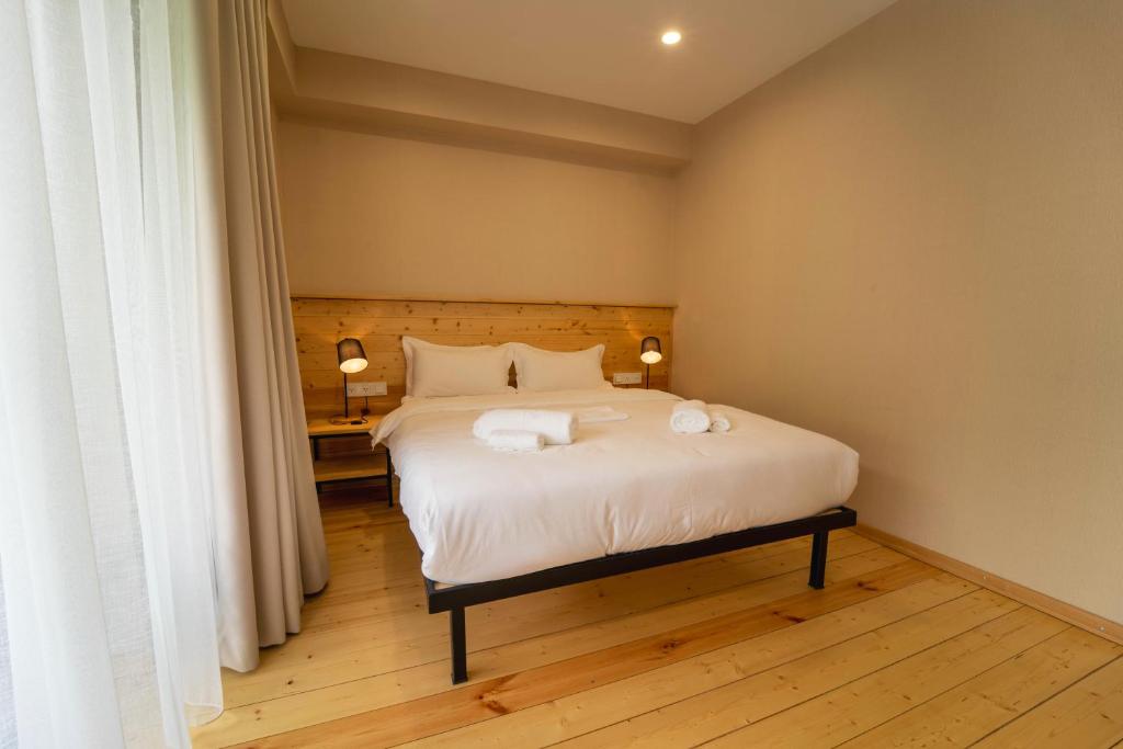 Postel nebo postele na pokoji v ubytování Lahili Boutique Hotel