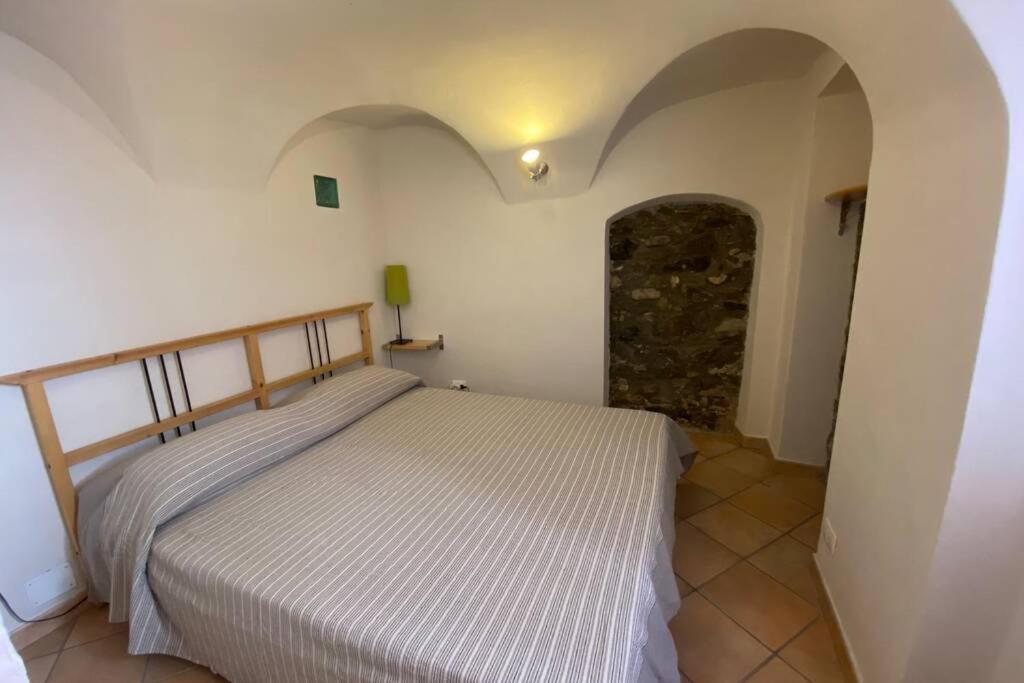 Posteľ alebo postele v izbe v ubytovaní Alloggio per Vacanze a Isolabona