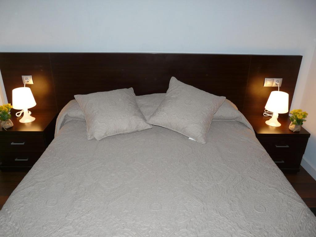 Posteľ alebo postele v izbe v ubytovaní El BALCÓN de PILAR
