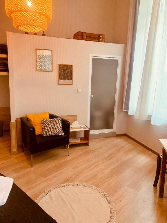 Posezení v ubytování Hotel Du Parlement