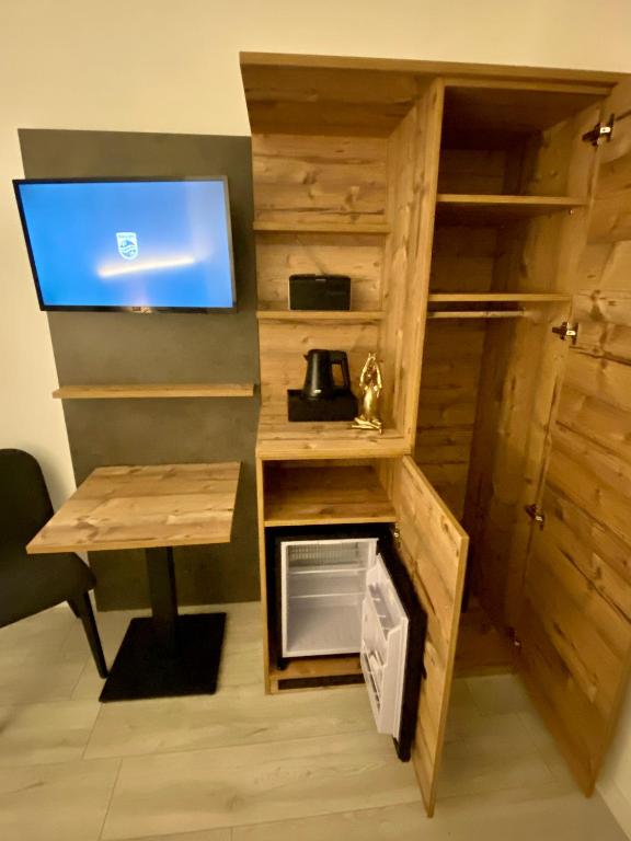 TV a/nebo společenská místnost v ubytování Hostel Harzer Hof