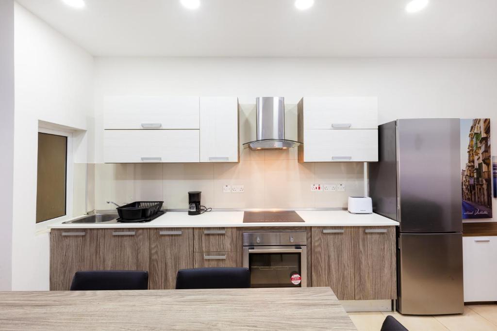 Una cocina o zona de cocina en PC3- Centrally Located Apt-Close to University