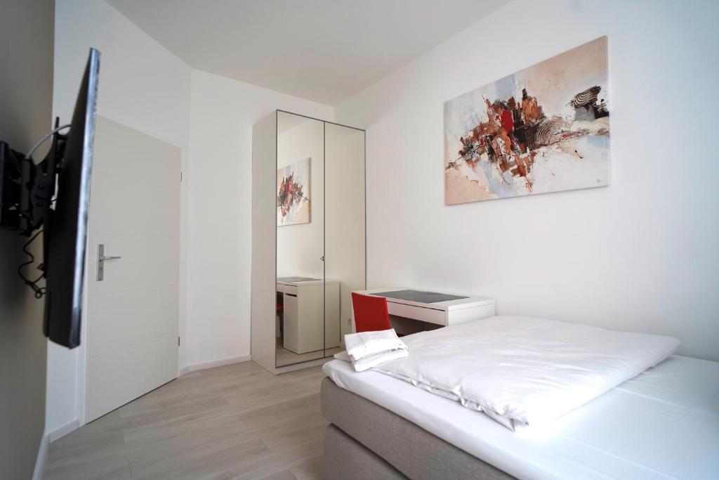Postel nebo postele na pokoji v ubytování Hotel Böke Rheinfelden