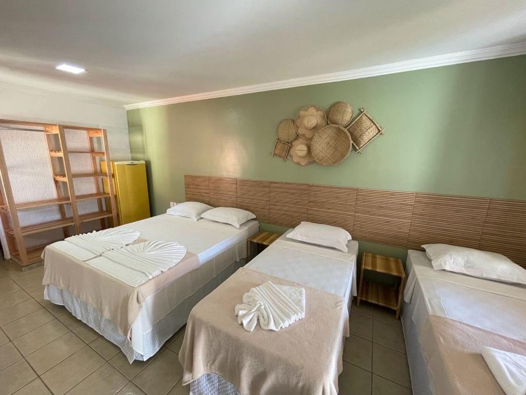 Postel nebo postele na pokoji v ubytování MUTA PRAIA HOTEL