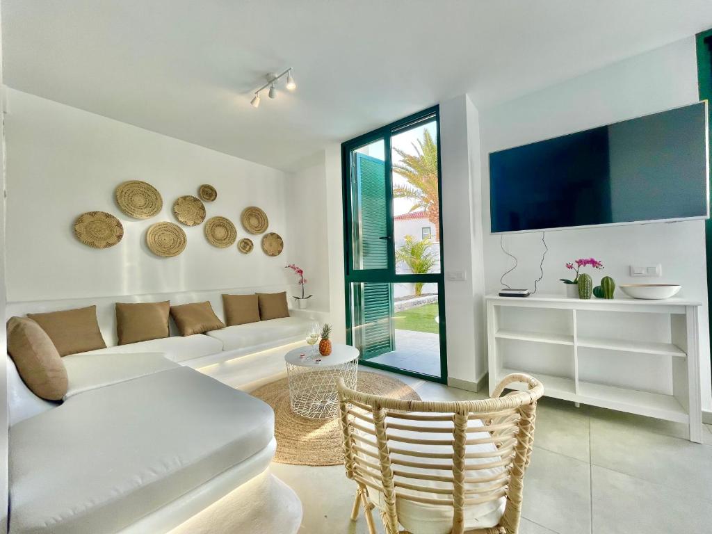 Televízia a/alebo spoločenská miestnosť v ubytovaní Taucho - private, heatable pool, BBQ, 4 bedrooms - Vivienda vacacional