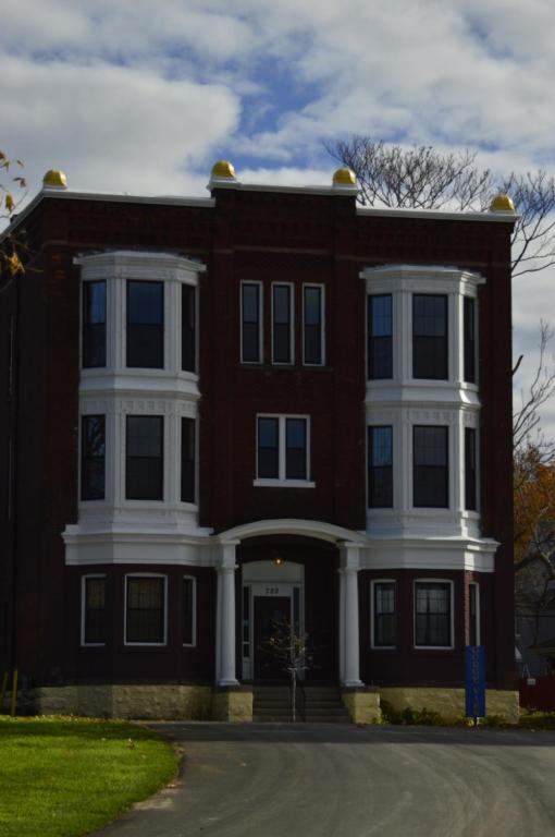 a large red brick building with white trim at Gorge View in Niagara Falls