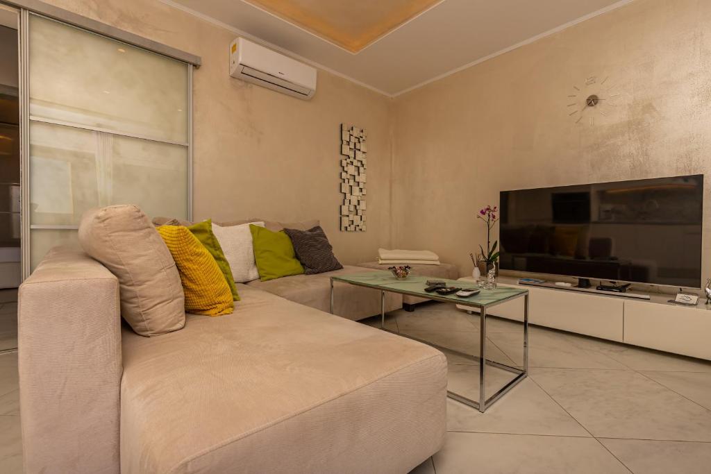 TV a/nebo společenská místnost v ubytování Apartment Rippl II