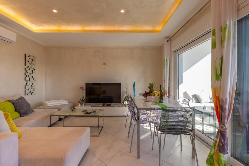 TV a/nebo společenská místnost v ubytování Apartment Rippl II
