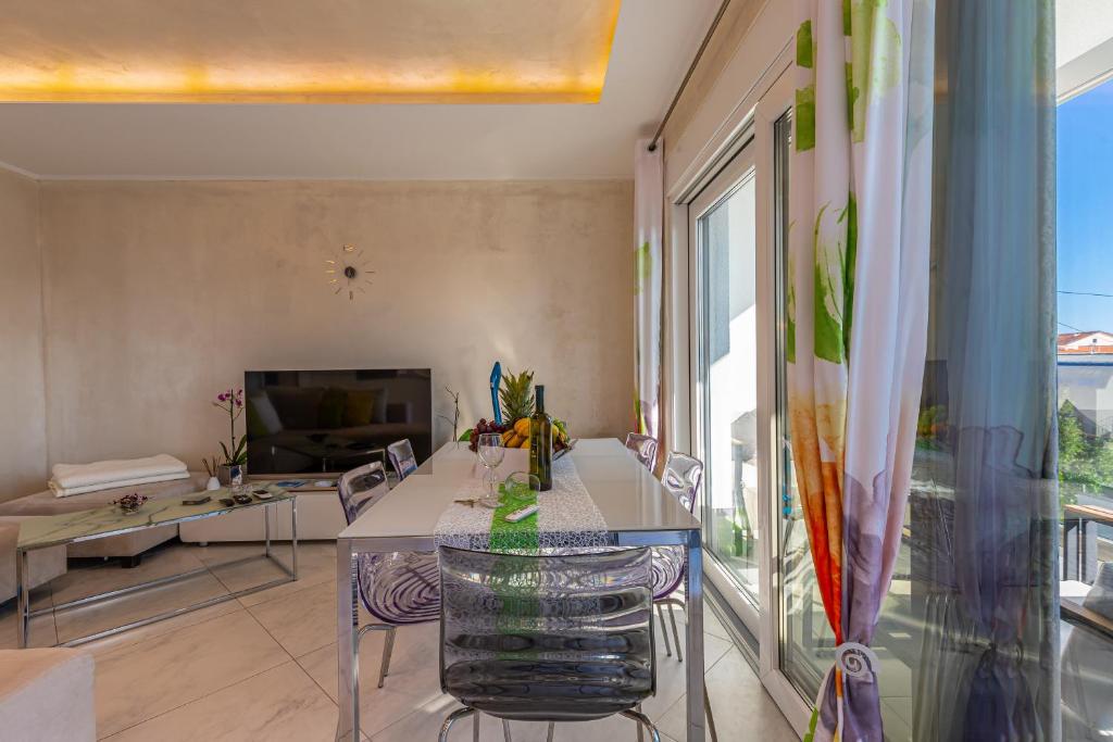 TV a/nebo společenská místnost v ubytování Apartment Rippl II