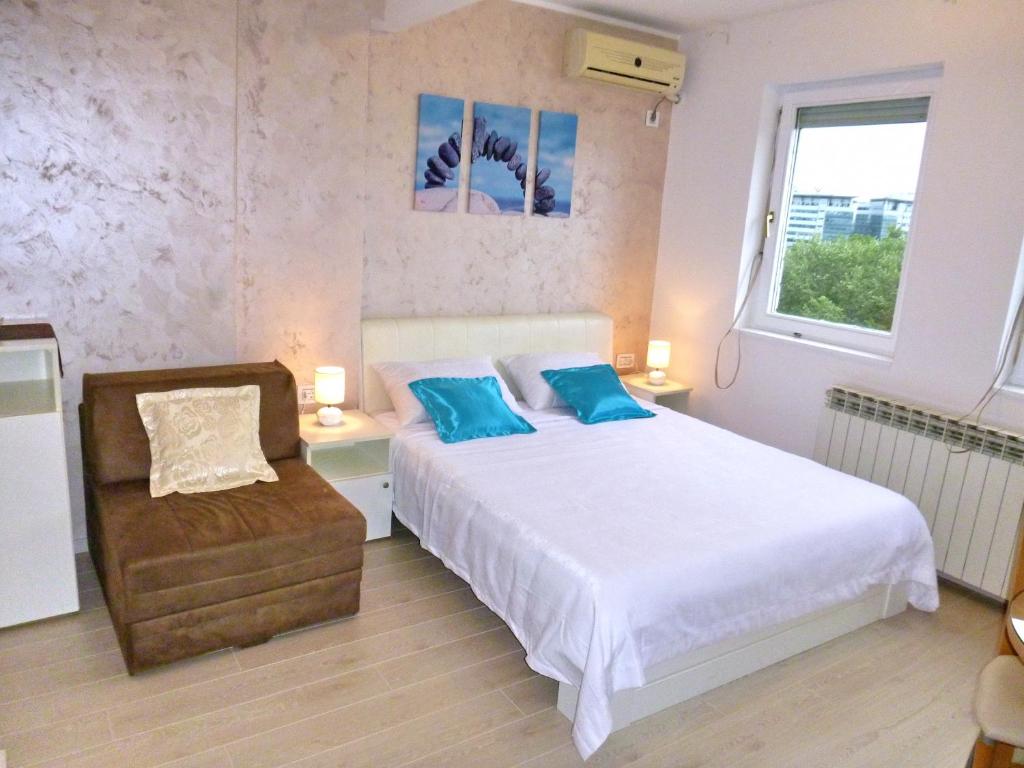Llit o llits en una habitació de Arena Dream Studio