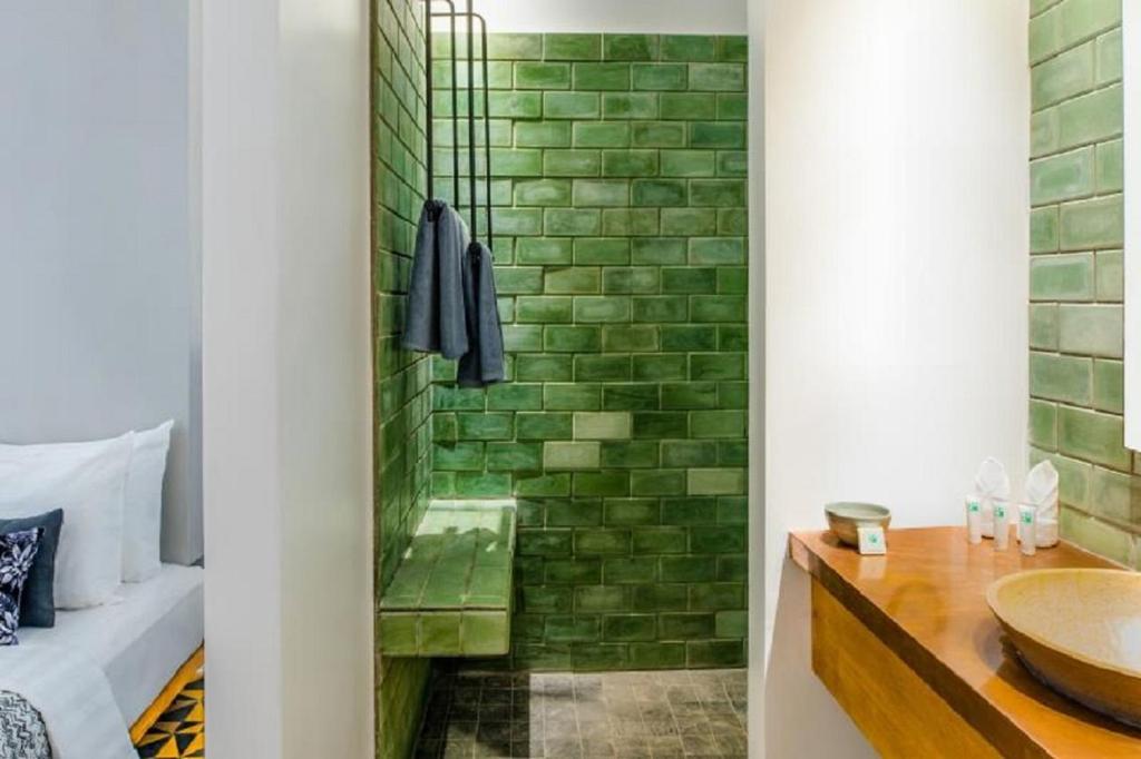 Koupelna v ubytování Atelier Hotel