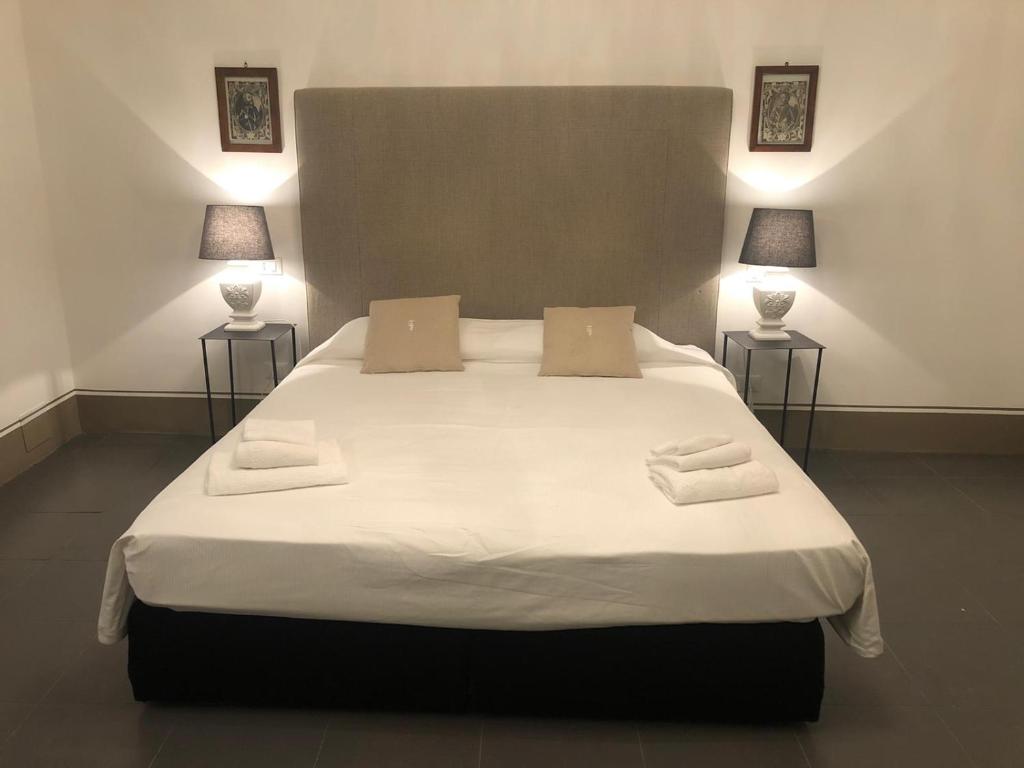Postel nebo postele na pokoji v ubytování Casa Modica - Luxury rooms