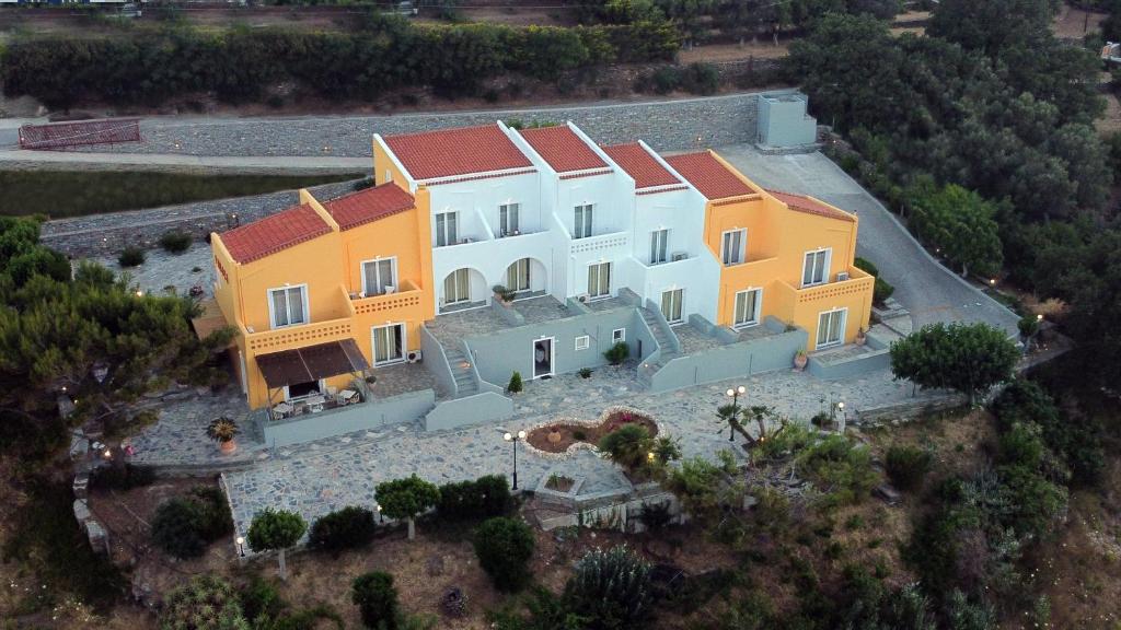 an aerial view of a large building at 9 Muses in Andros