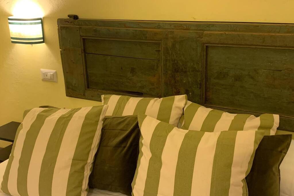 A bed or beds in a room at Azienda Agricola Maremma Bio