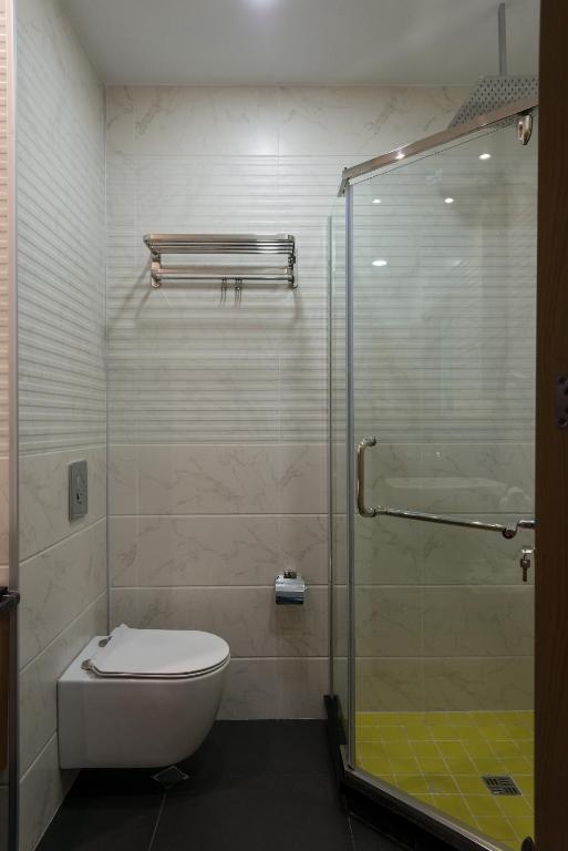 Koupelna v ubytování Grand Opera Hotel