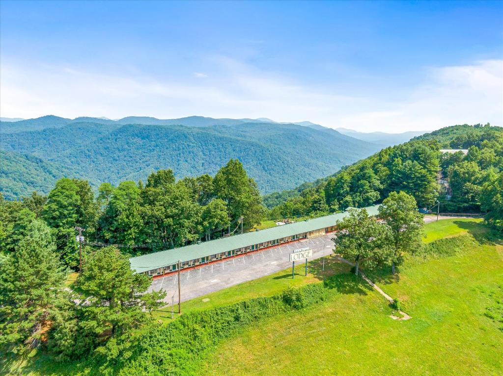 an aerial view of a train in the mountains at Early Blue Motel in Saluda