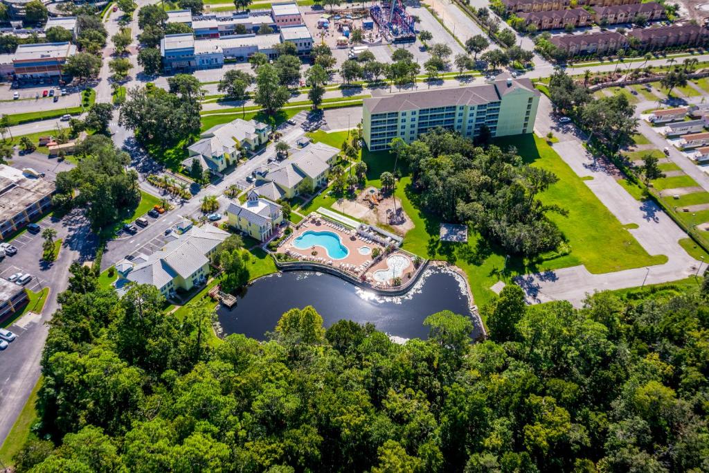 an aerial view of a park with a pool and a building at Barefoot Suite by Capital Vacations in Orlando
