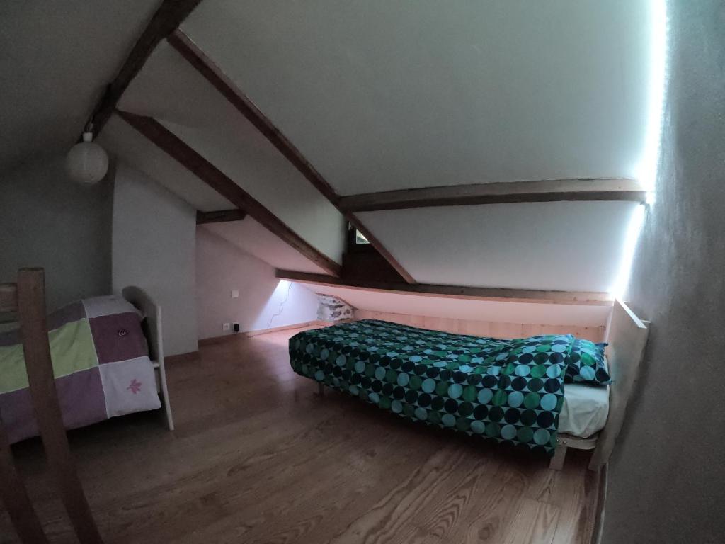 Postel nebo postele na pokoji v ubytování Gîte Ispagnac