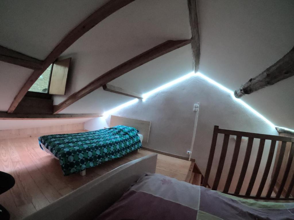 Postel nebo postele na pokoji v ubytování Gîte Ispagnac