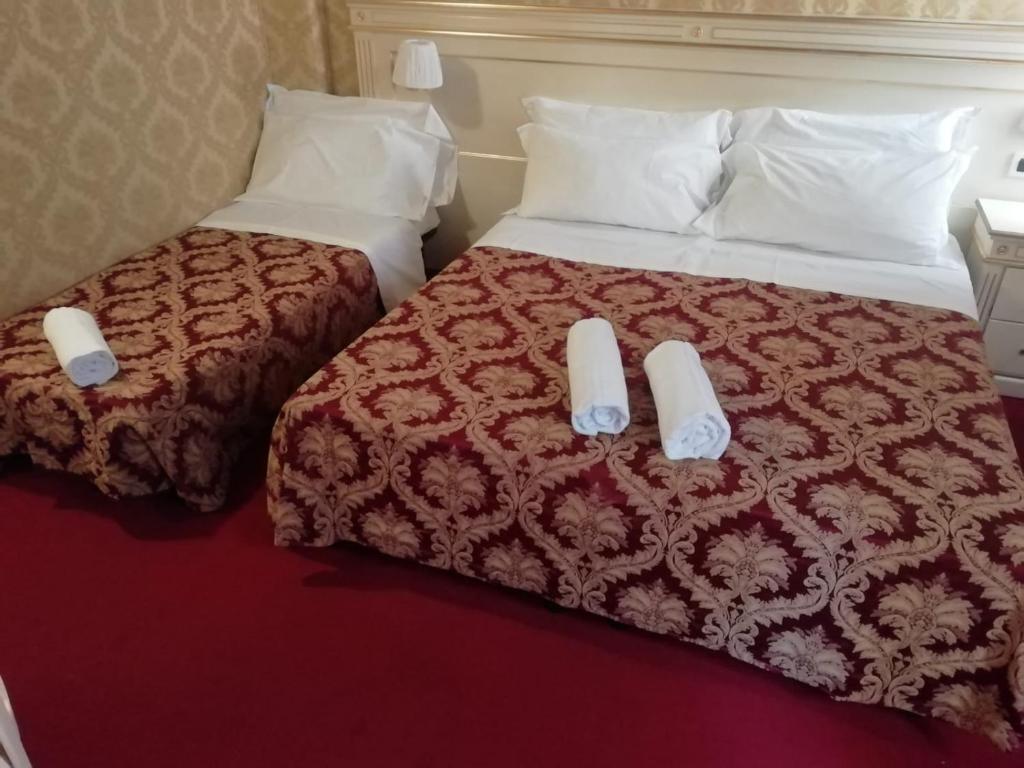 Postel nebo postele na pokoji v ubytování CASA MARGOT