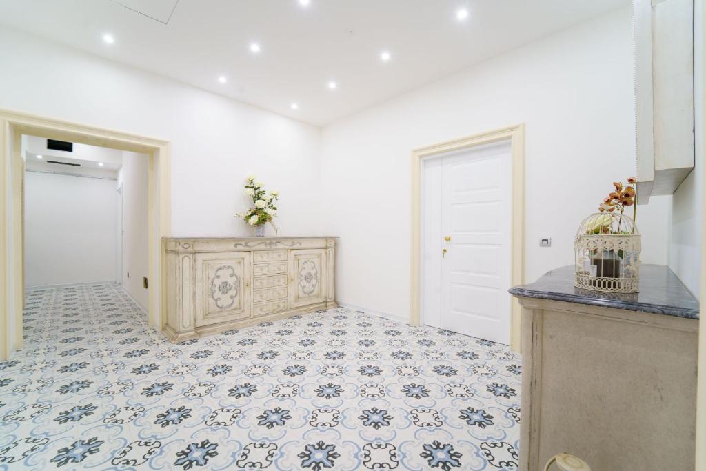 A kitchen or kitchenette at PLAZA Boutique Hotel - Tropea