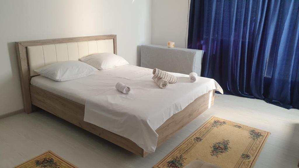 מיטה או מיטות בחדר ב-Apartman Sava