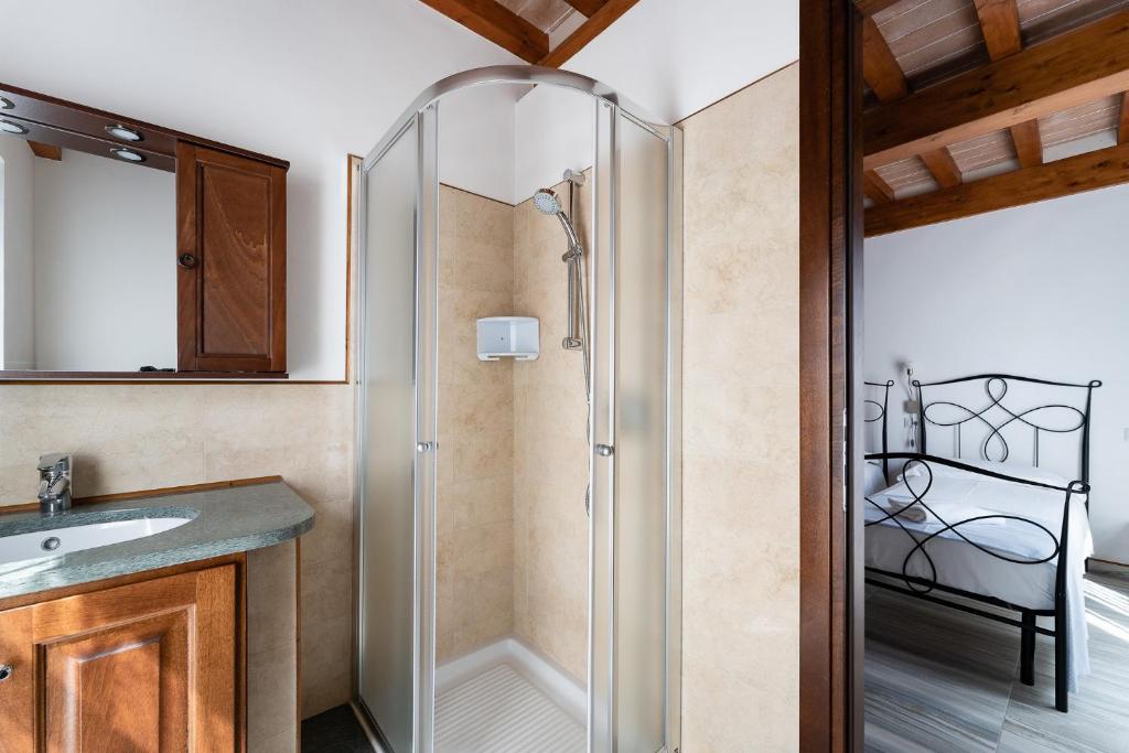 Koupelna v ubytování Hotel Delfino