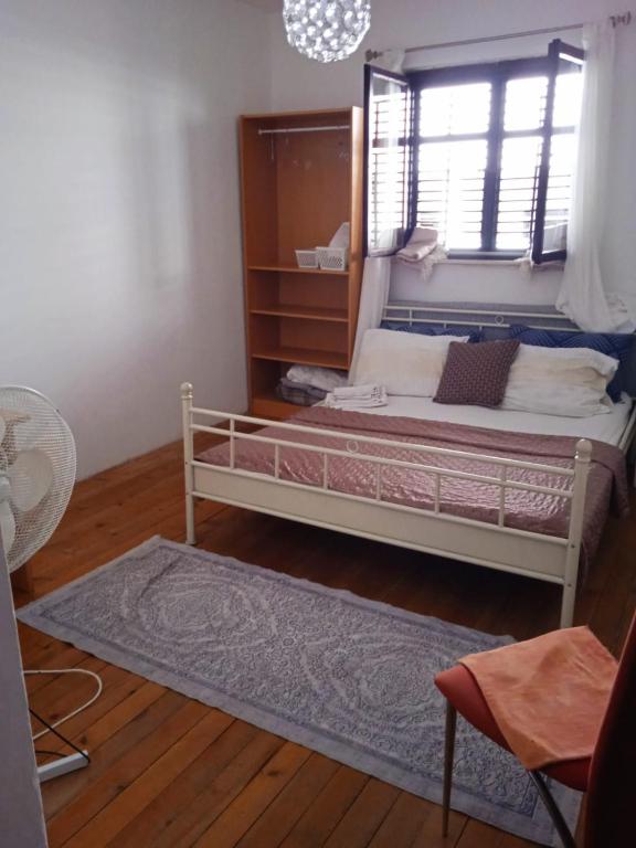 Posteľ alebo postele v izbe v ubytovaní Guesthouse Alliya