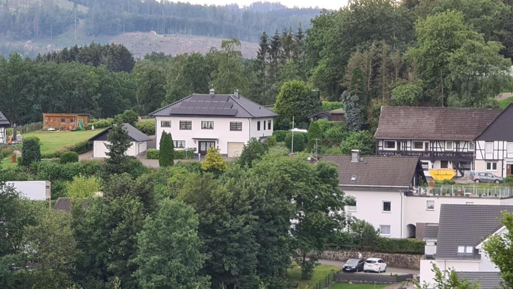 a group of houses in a residential neighborhood at Ferienwohnung im Sauerland - nähe Olpe (Biggesee) in Drolshagen