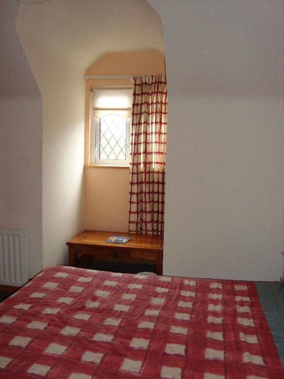 Postel nebo postele na pokoji v ubytování Hy Breasal B&B