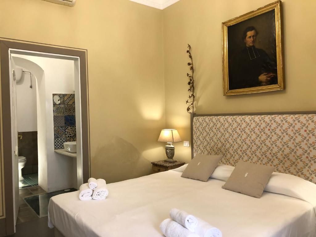 Postel nebo postele na pokoji v ubytování Casa Modica - Luxury rooms