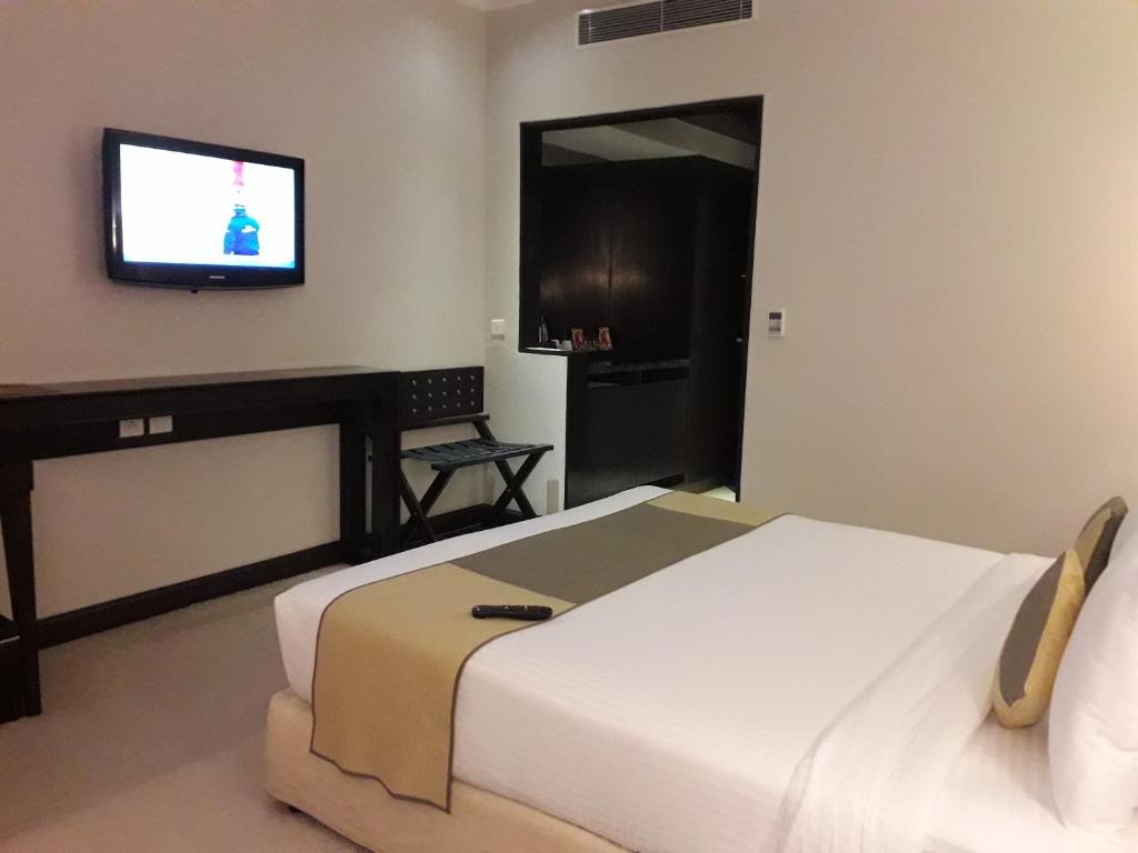 TV a/nebo společenská místnost v ubytování Goldfinch Hotel Delhi NCR