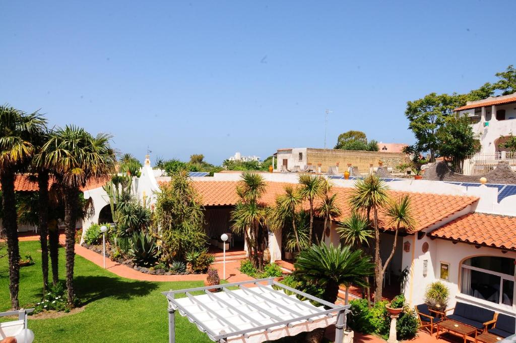 an aerial view of a house with palm trees at Hotel Belsole in Ischia