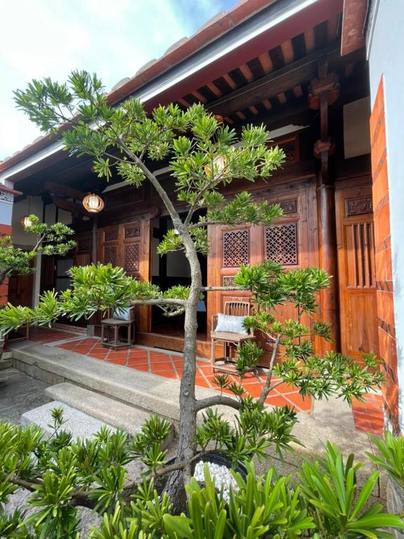 Zahrada ubytování 金門古寧歇心苑官宅古厝民宿 Guning Xiexinyuan Historical Inn