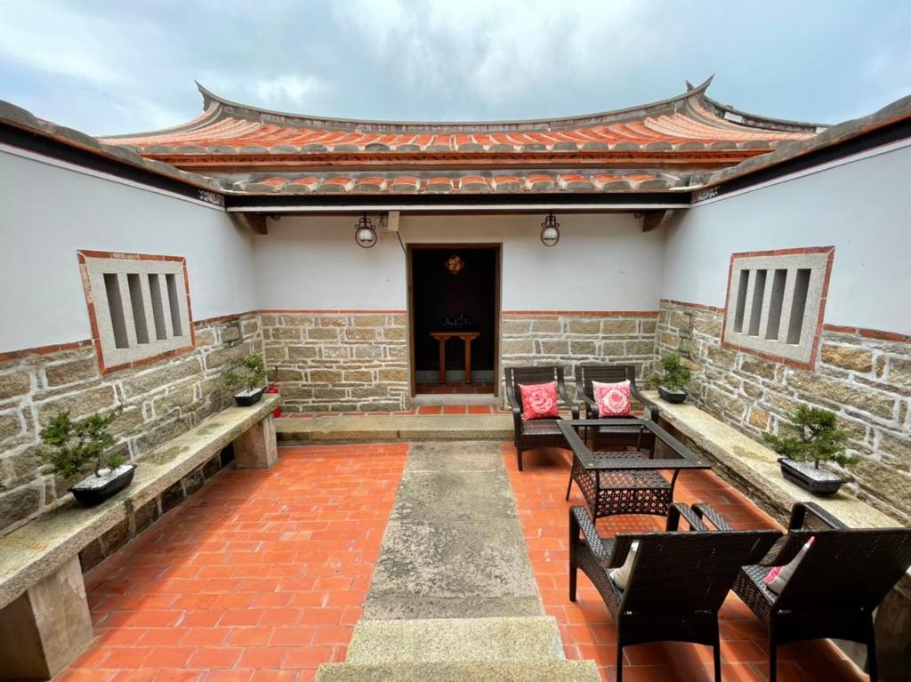Balkón nebo terasa v ubytování 金門古寧歇心苑官宅古厝民宿 Guning Xiexinyuan Historical Inn