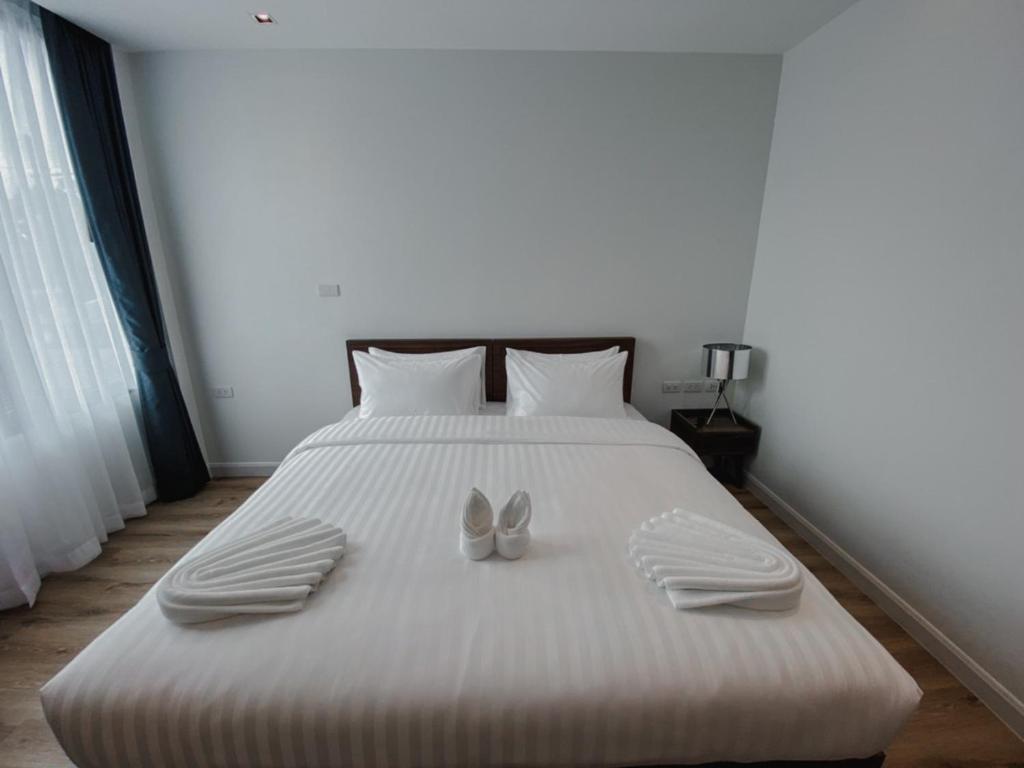 Cama ou camas em um quarto em Play Poshtel & Cafe'