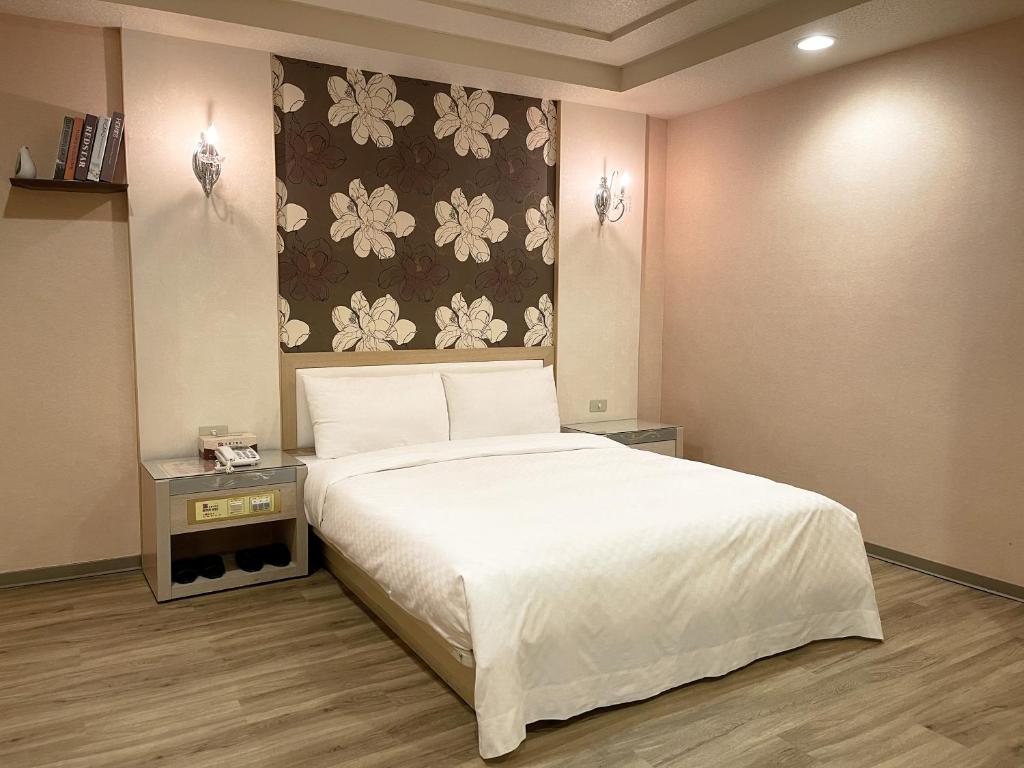 Postel nebo postele na pokoji v ubytování Beidoo Hotel