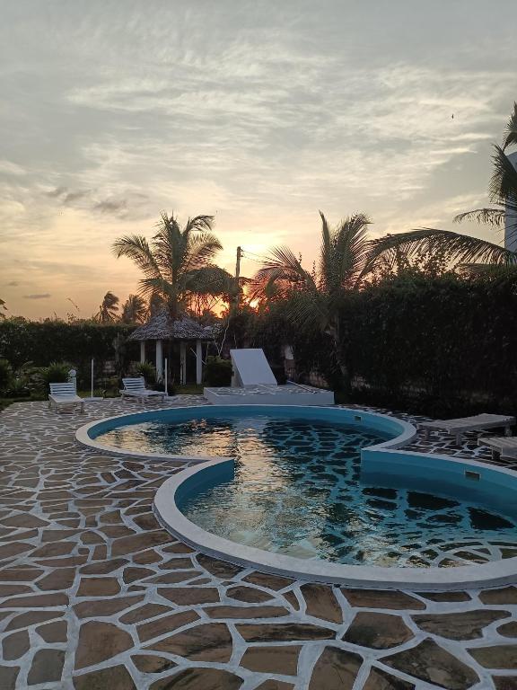 Bazén v ubytování Watamu Neverland Villas nebo v jeho okolí