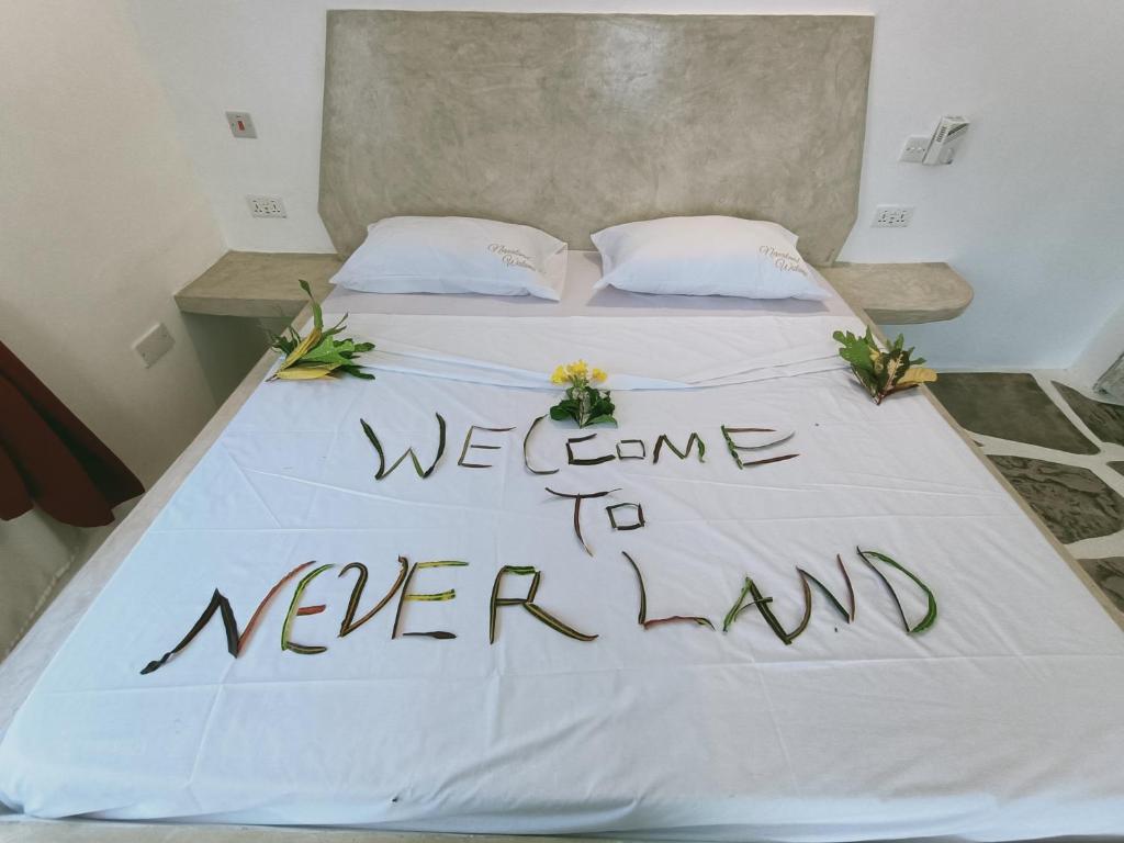 Postel nebo postele na pokoji v ubytování Watamu Neverland Villas